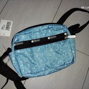 New with tags lesportsac cross body,fannypack